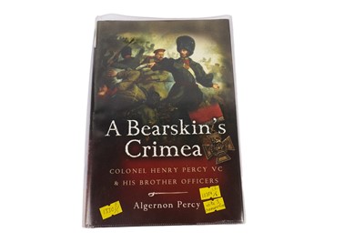 Lot 118 - Three pieces of Staffordshire pottery; and a signed book commemorating the Crimean War
