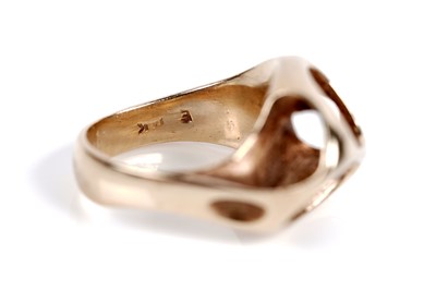 Lot 529 - Two Mid-Century and Modern style gold rings