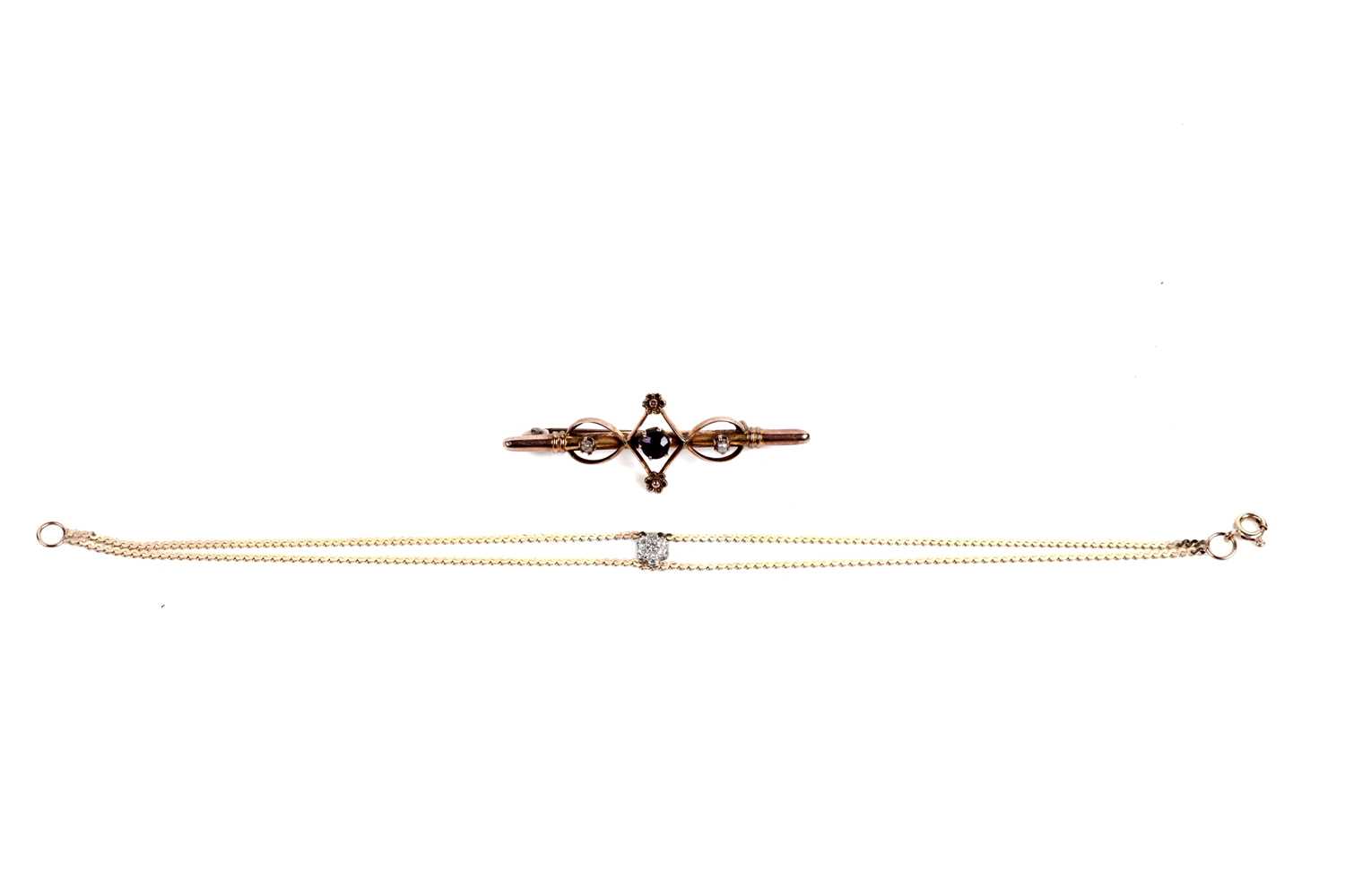 Lot 565 - A diamond bracelet; and a Victorian amethyst and seed pearl bar brooch