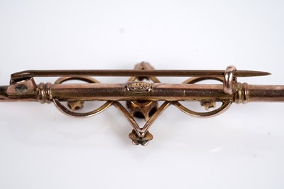 Lot 565 - A diamond bracelet; and a Victorian amethyst and seed pearl bar brooch