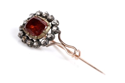 Lot 523 - A Georgian spessartine garnet and diamond brooch
