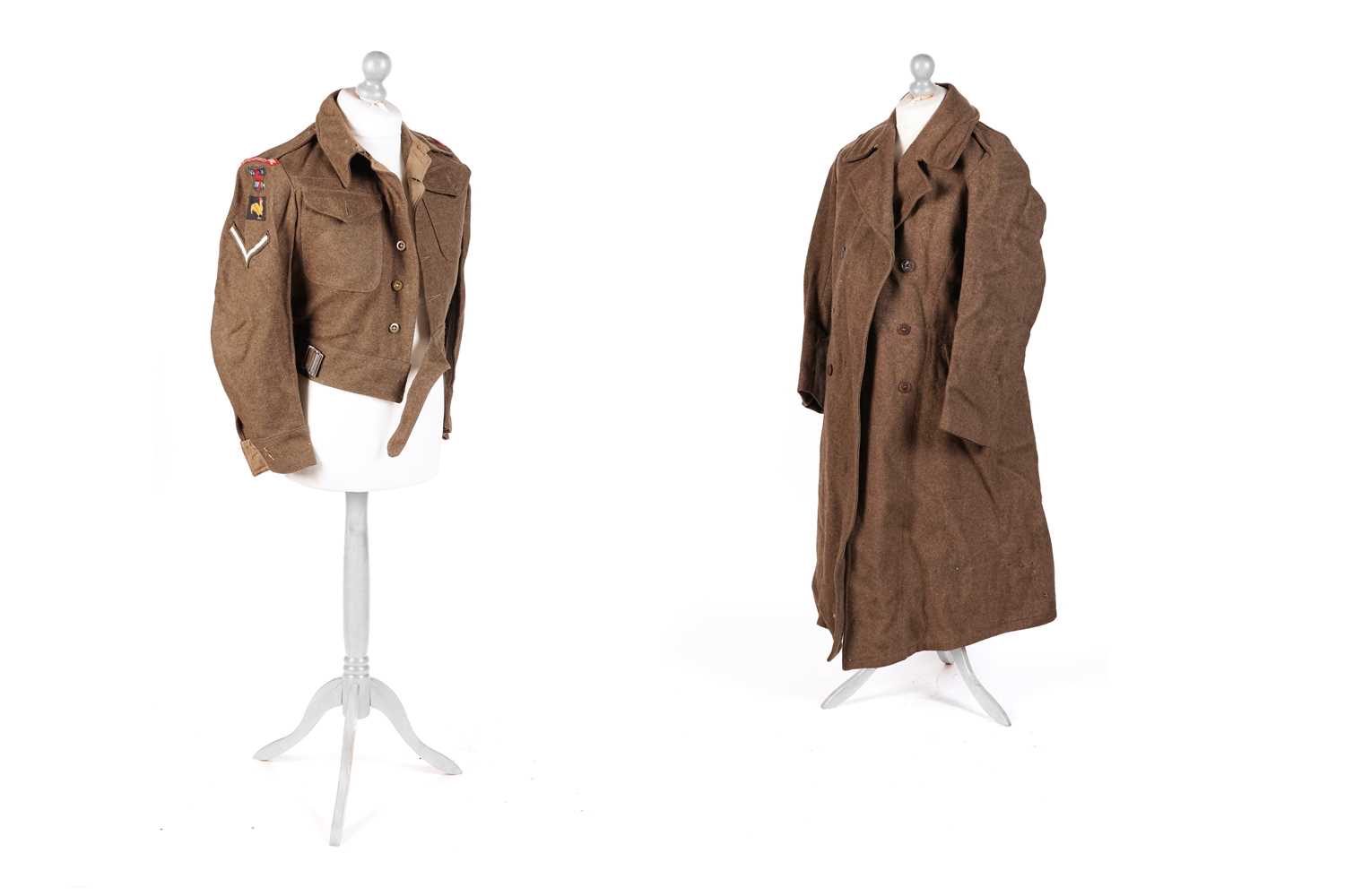 Lot 331 - A Second World War battledress tunic; and other items