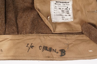 Lot 331 - A Second World War battledress tunic; and other items