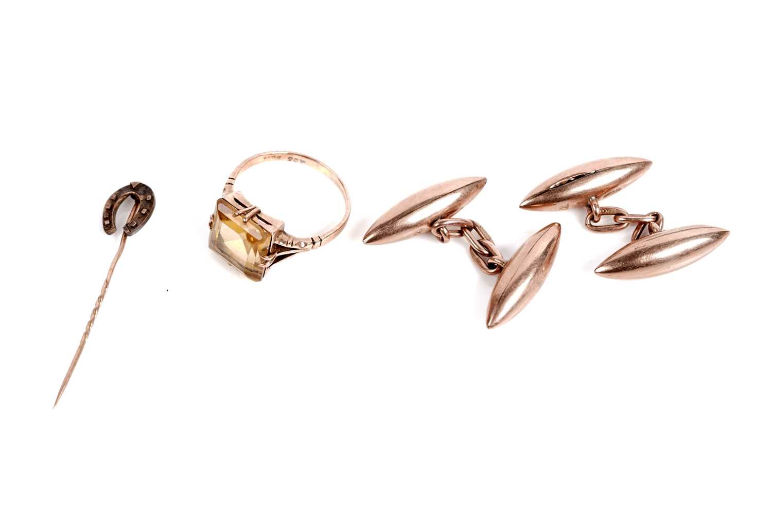 Lot 527 - A citrine ring, rose gold cufflinks, and a lucky horseshoe pin