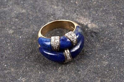 Lot 517 - A lapis lazuli and diamond dress ring