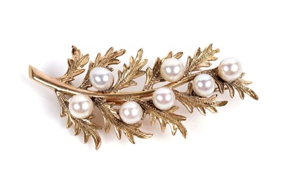 Lot 528 - Two brooches, one in the form of a bow, the other a berried sprig