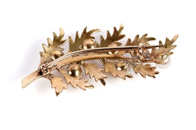 Lot 528 - Two brooches, one in the form of a bow, the other a berried sprig