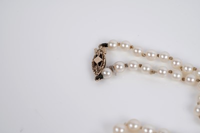 Lot 559 - Pearl necklaces; and a synthetic sapphire floral spray brooch