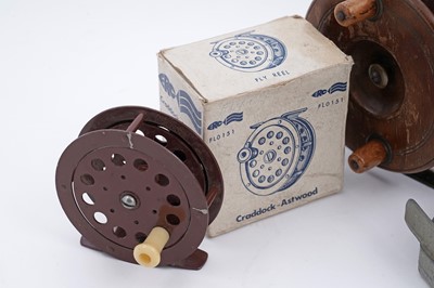 Lot 189 - A collection of fishing reels and landing nets