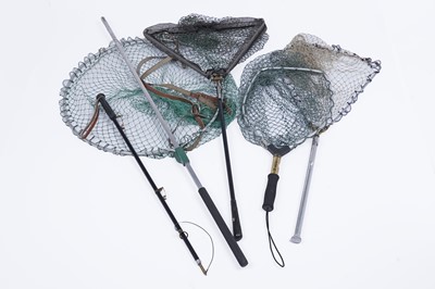 Lot 189 - A collection of fishing reels and landing nets