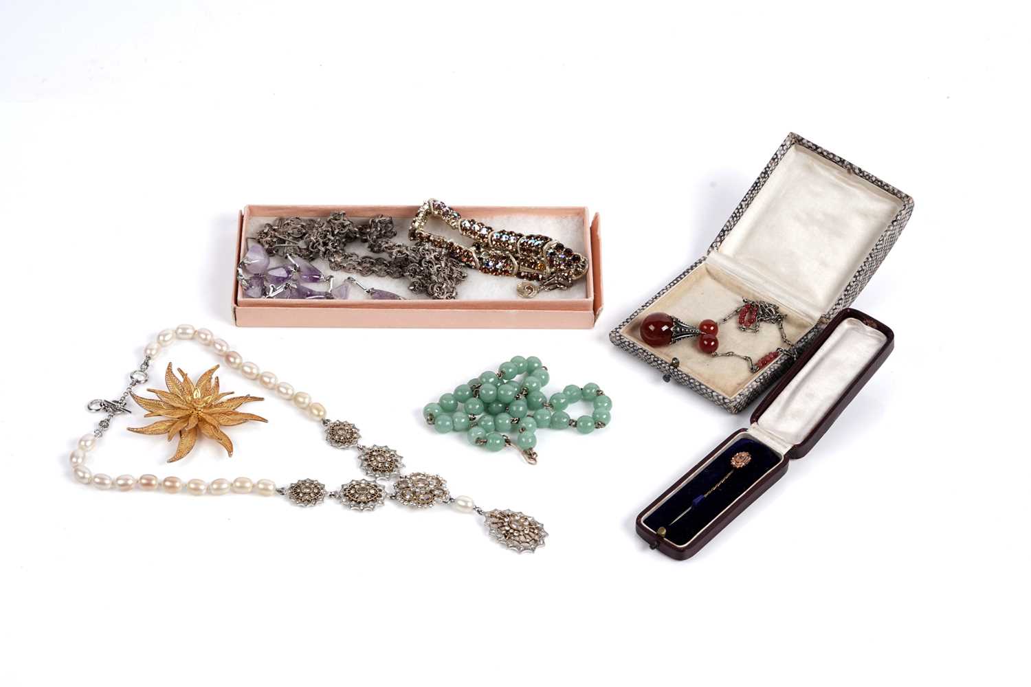 Lot 571 - Antique and modern costume jewellery including: a Victorian sapphire stick pin