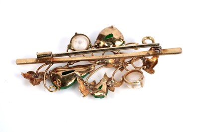Lot 543 - A jadeite and pearl foliate pattern brooch