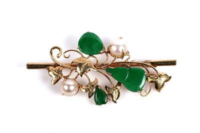 Lot 543 - A jadeite and pearl foliate pattern brooch