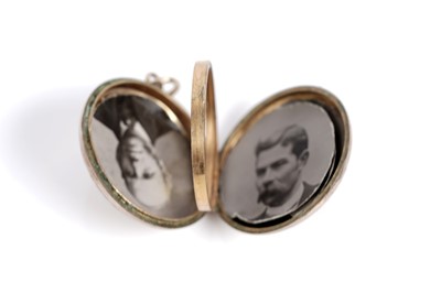Lot 572 - Pendants and necklaces including: a captive pearl and antique locket