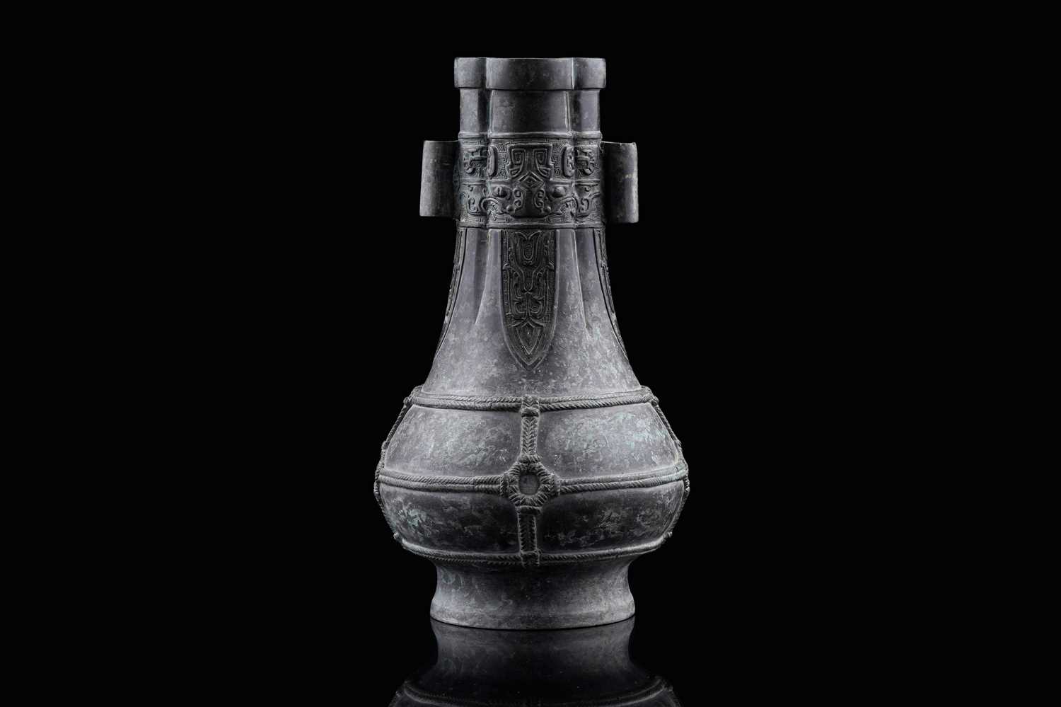Lot 827 - A Chinese bronze arrow vase