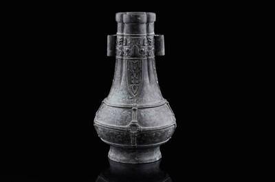 Lot 827 - A Chinese bronze arrow vase