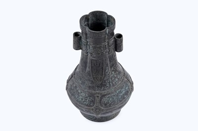 Lot 827 - A Chinese bronze arrow vase