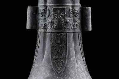 Lot 827 - A Chinese bronze arrow vase