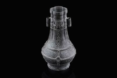 Lot 827 - A Chinese bronze arrow vase