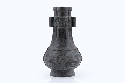 Lot 827 - A Chinese bronze arrow vase