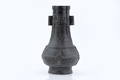 Lot 827 - A Chinese bronze arrow vase