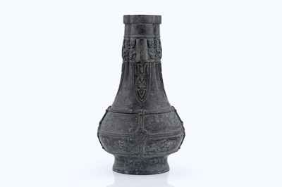 Lot 827 - A Chinese bronze arrow vase