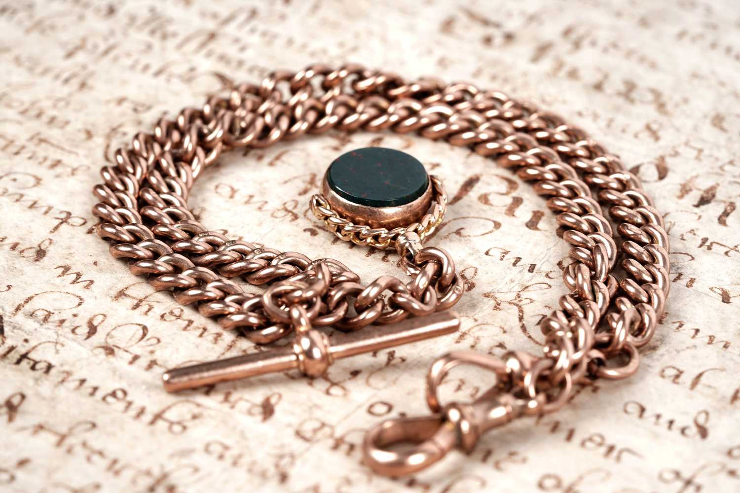Lot 68 - A 9ct rose gold "Albert" curb-link double watch chain