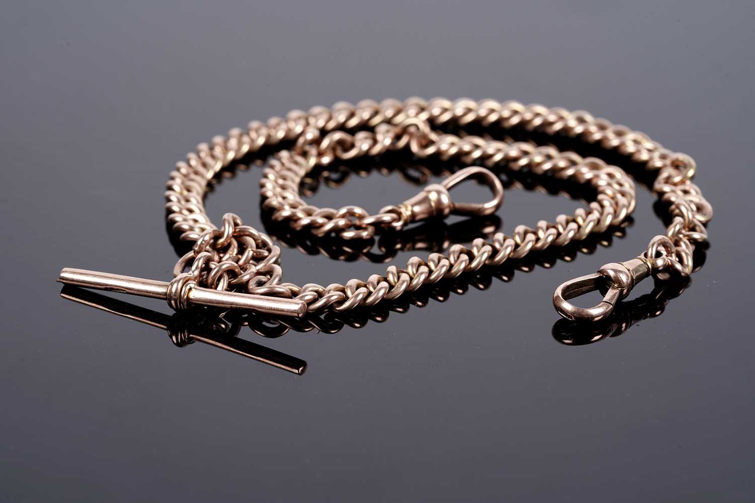 Lot 75 - A 9ct rose gold "Albert" curb-link double watch chain