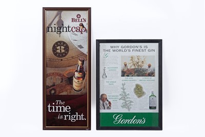 Lot 205 - Two framed advertising posters; and a Johnnie Walker clock
