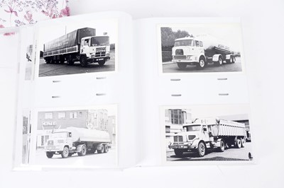 Lot 100 - Two albums of postcards; and three photograph albums