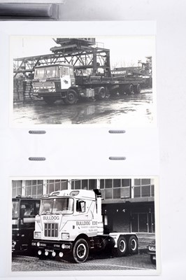 Lot 100 - Two albums of postcards; and three photograph albums