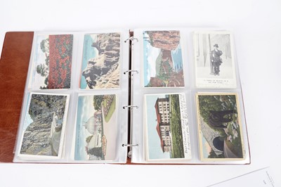 Lot 100 - Two albums of postcards; and three photograph albums