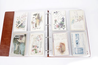 Lot 100 - Two albums of postcards; and three photograph albums
