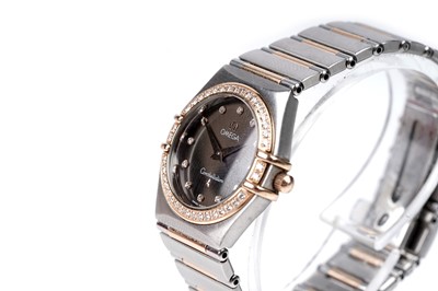 Lot 436 - Omega Constellation: a stainless steel, rose gold and diamond cased lady's wristwatch