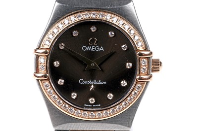 Lot 436 - Omega Constellation: a stainless steel, rose gold and diamond cased lady's wristwatch