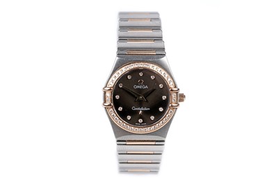 Lot 436 - Omega Constellation: a stainless steel, rose gold and diamond cased lady's wristwatch