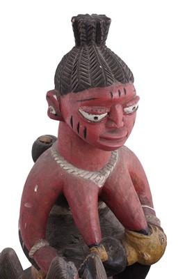 Lot 168 - A collection of 20th Century carved African figures; and four wicker work baskets