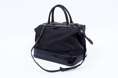 Lot 228 - A Gucci bag of black patent leather and canvas