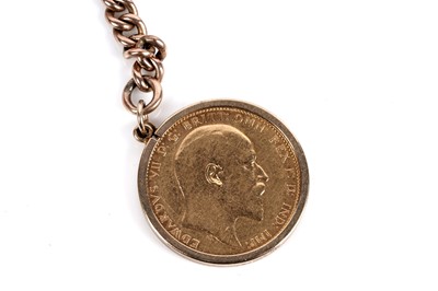 Lot 15 - A 9ct rose gold "Albert" watch chain with 1909 gold sovereign fob