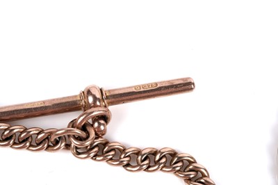 Lot 15 - A 9ct rose gold "Albert" watch chain with 1909 gold sovereign fob