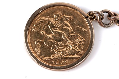 Lot 15 - A 9ct rose gold "Albert" watch chain with 1909 gold sovereign fob