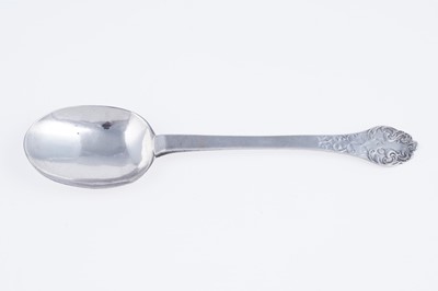 Lot 147 - A James II silver lace-back trefid spoon