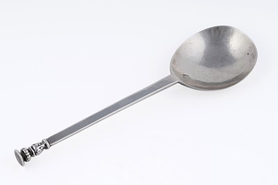 Lot 160 - A curious ‘out of period’ William & Mary silver seal top spoon