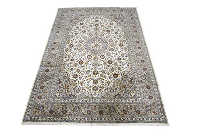 Lot 979 - A Persian hand-knotted Kashan carpet