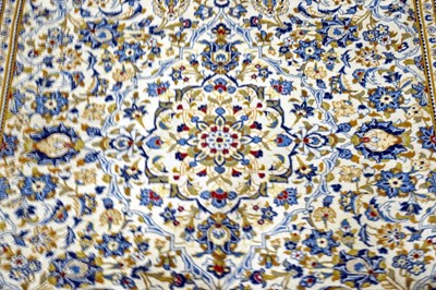 Lot 983 - A Persian hand-knotted Nain carpet