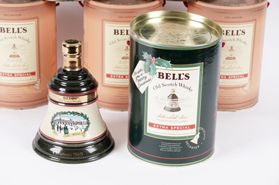 Lot 19 - Eleven Bell's whisky decanters; and two miniature decanters