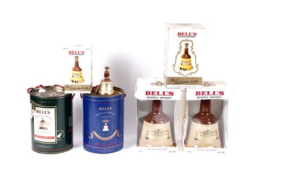 Lot 19 - Eleven Bell's whisky decanters; and two miniature decanters