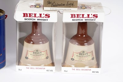 Lot 19 - Eleven Bell's whisky decanters; and two miniature decanters