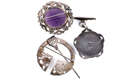 Lot 16 - Three silver brooches including: an Ola Gorie penannular brooch