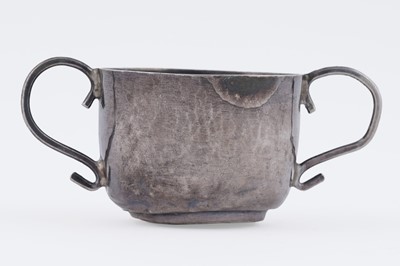 Lot 74 - A William & Mary miniature silver porringer